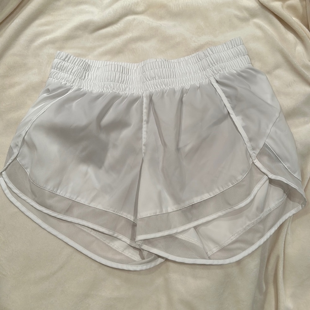 Athleta mesh racer run short 4” size xs